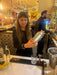 Camilla learning professional shaking methods behind the bar at Dirextra