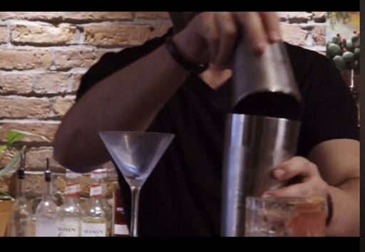 Instructor demonstrating advanced shaking techniques during the Advanced Mixology Course